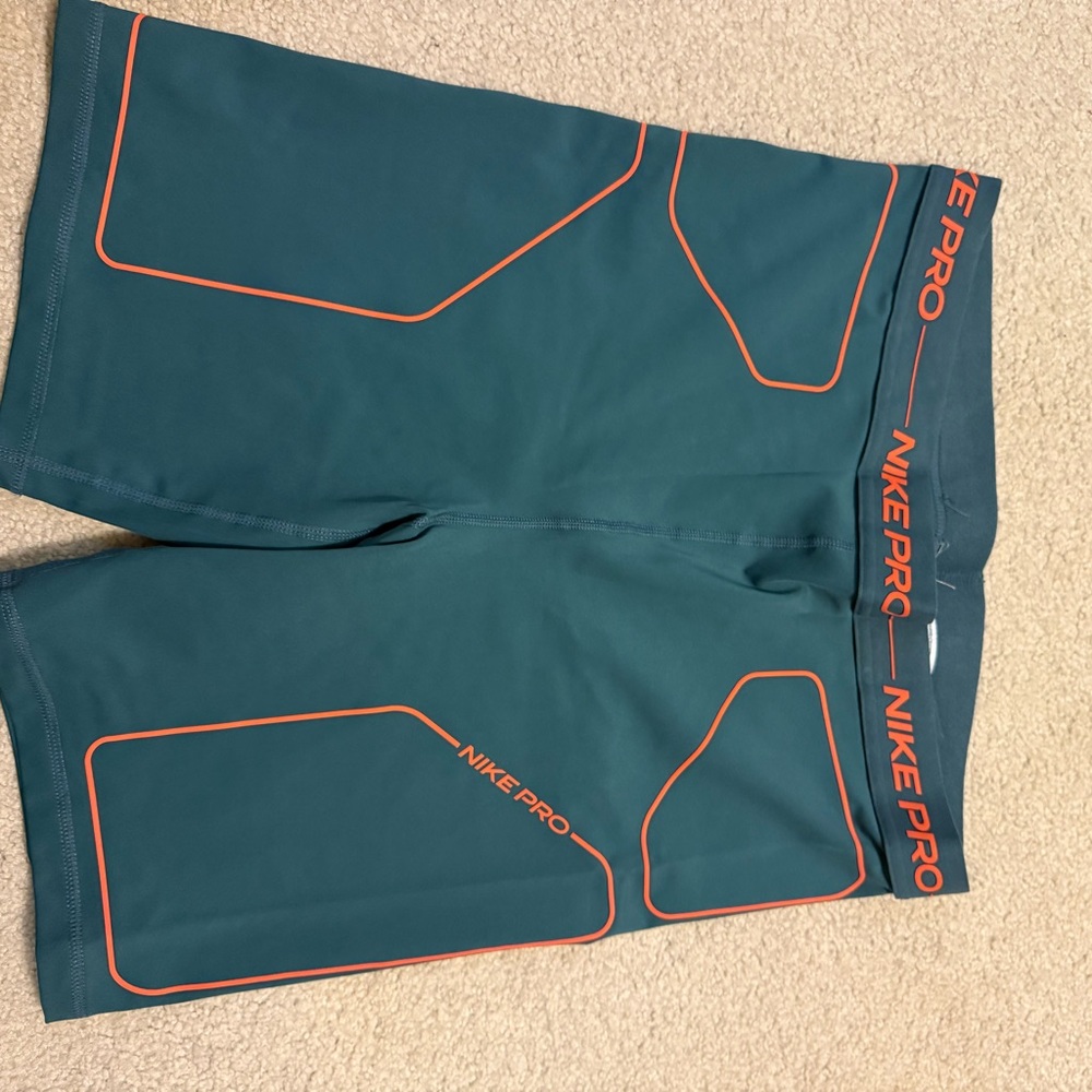Nike Pro Men's Blue Shorts with Orange Accents